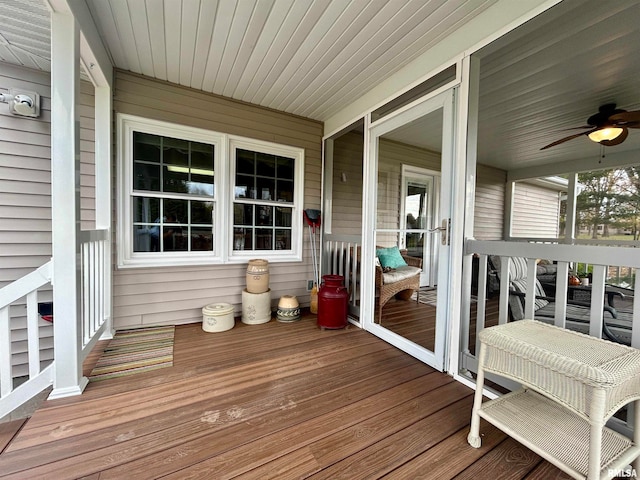 wooden terrace with ceiling fan