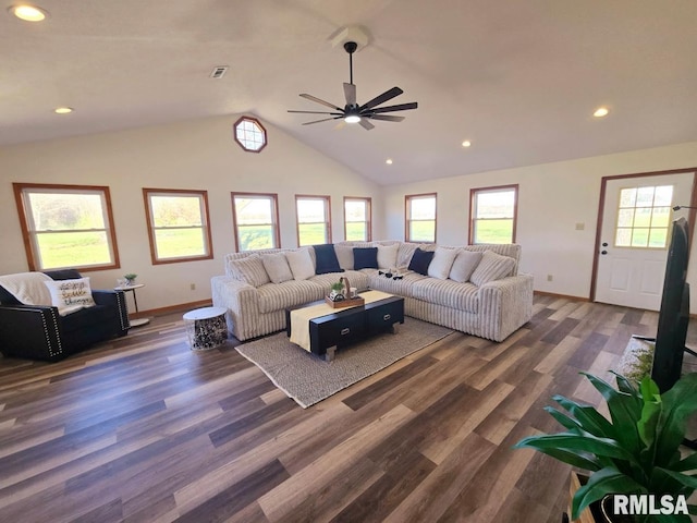 living room featuring vaulted ceiling, ceiling fan, and dark wood-type flooring