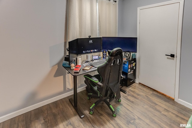 office space with hardwood / wood-style flooring