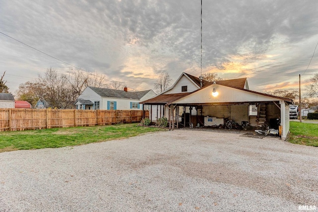 exterior space with a carport