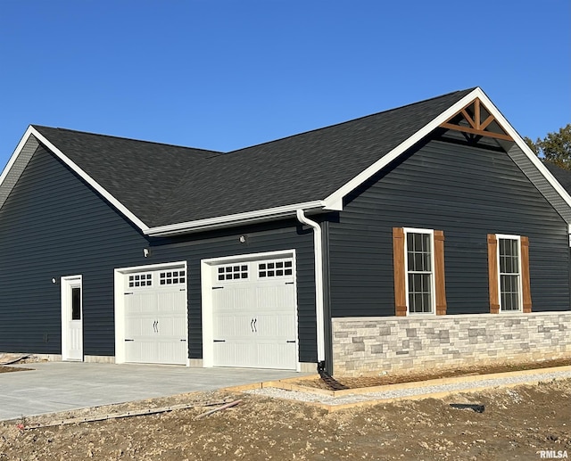 view of home's exterior featuring a garage