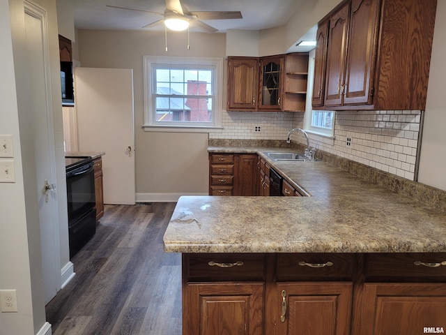 kitchen with backsplash, dark wood-type flooring, black appliances, sink, and ceiling fan