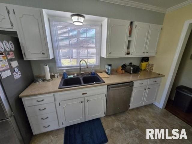 kitchen with crown molding, sink, white cabinets, and appliances with stainless steel finishes