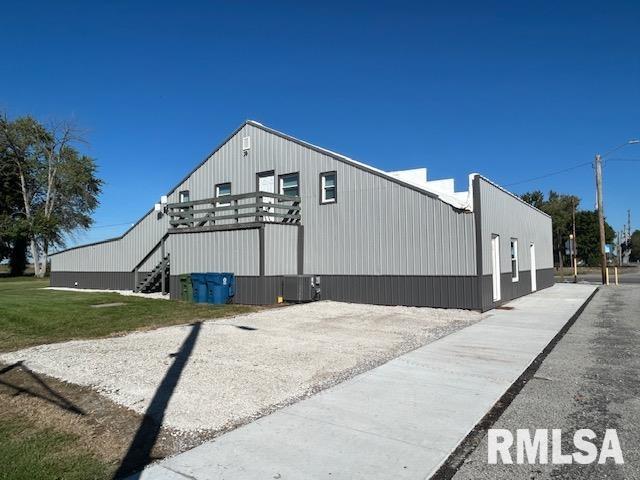 102 W 3rd St, Ina, IL 62846 - view of home's exterior with stairs