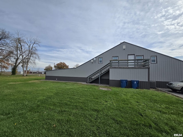 102 W 3rd St, Ina, IL 62846 - back of house with stairway and a yard