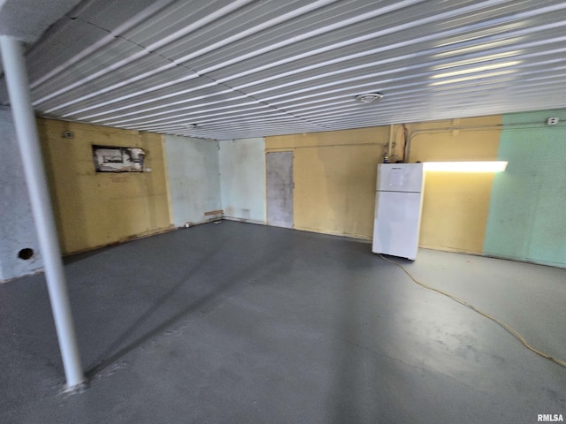 102 W 3rd St, Ina, IL 62846 - below grade area featuring freestanding refrigerator