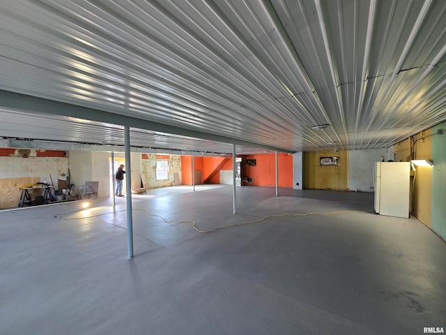 garage featuring white refrigerator