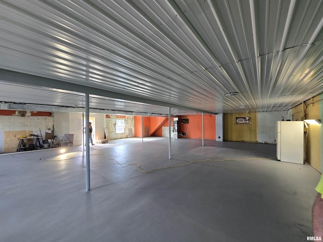 102 W 3rd St, Ina, IL 62846 - garage with freestanding refrigerator