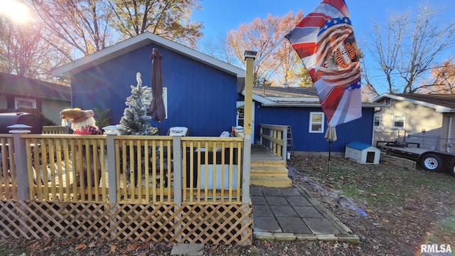 rear view of property with a deck