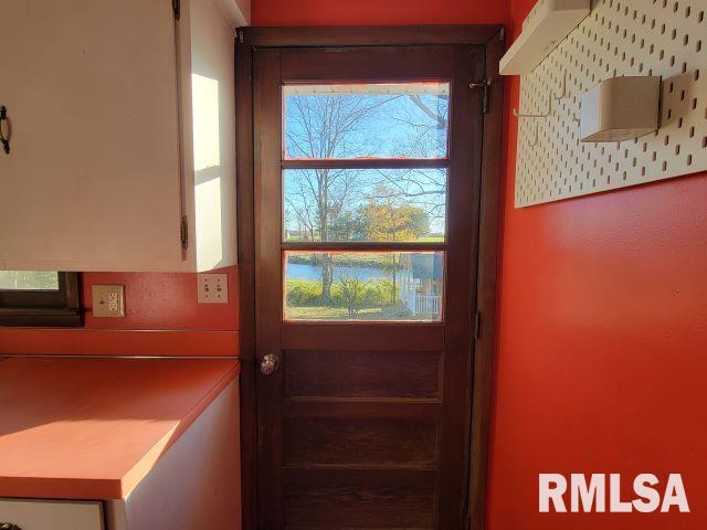 doorway to outside featuring a wealth of natural light