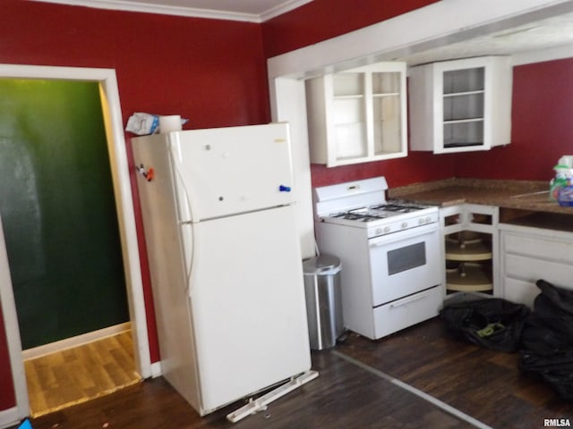 805 Samuel St, Christopher, IL 62822 - kitchen featuring white appliances, dark wood-style floors, crown molding, and dark countertops
