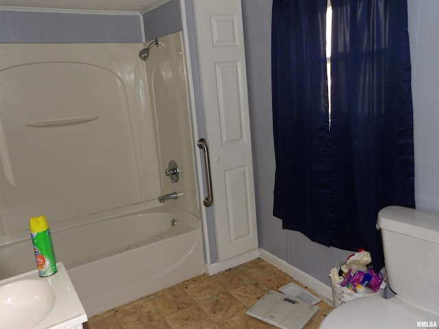 805 Samuel St, Christopher, IL 62822 - bathroom featuring toilet, shower / bathtub combination, and baseboards