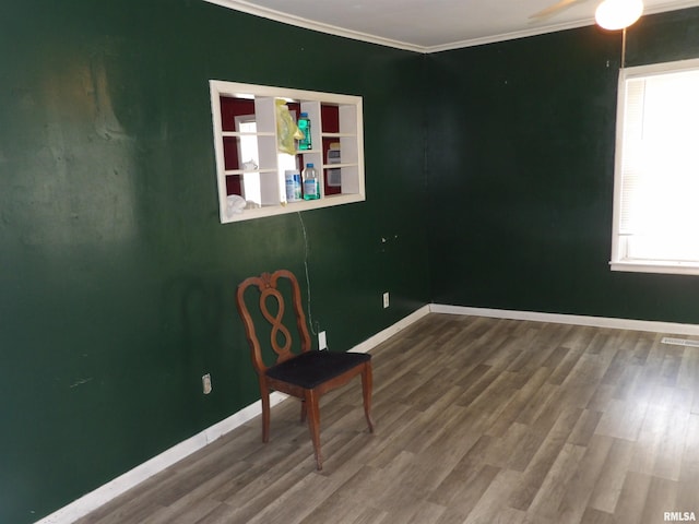805 Samuel St, Christopher, IL 62822 - unfurnished room with ornamental molding, wood finished floors, ceiling fan, and baseboards