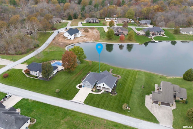 birds eye view of property featuring a water view