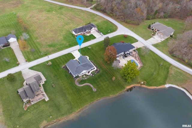 birds eye view of property featuring a water view