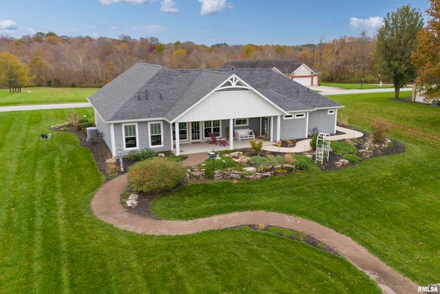 exterior space featuring a patio and a lawn