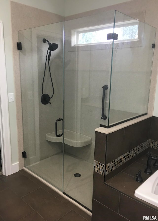 bathroom with plus walk in shower and tile patterned floors