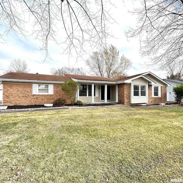 ranch-style home with a front yard