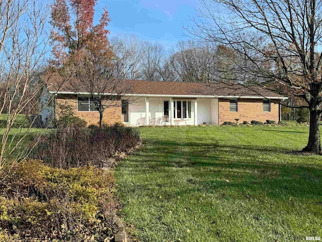 ranch-style house with a front lawn