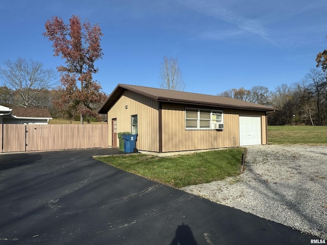 view of property exterior with a yard and cooling unit