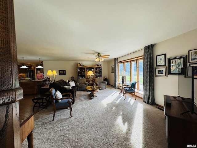 living room with ceiling fan