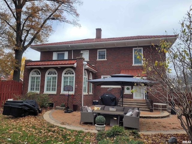 rear view of house featuring outdoor lounge area