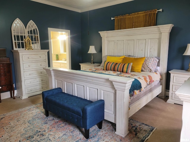 bedroom featuring connected bathroom, light colored carpet, and crown molding