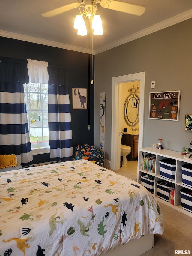 bedroom with light carpet, connected bathroom, ceiling fan, and crown molding