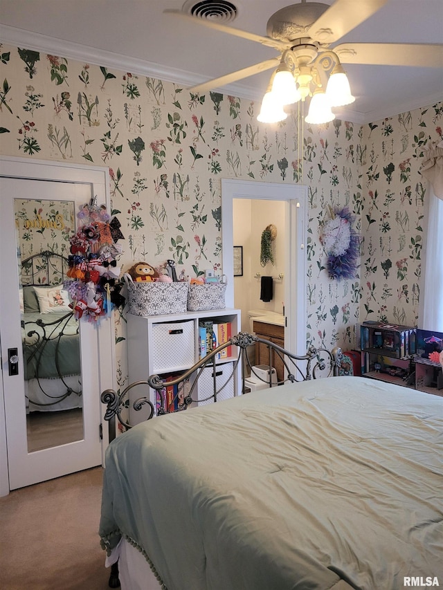 bedroom with carpet flooring, crown molding, and ceiling fan