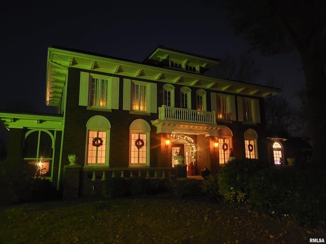 italianate home with a balcony