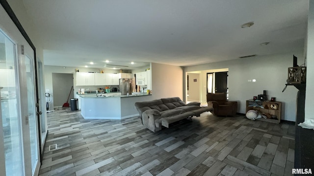 living room with light wood-type flooring