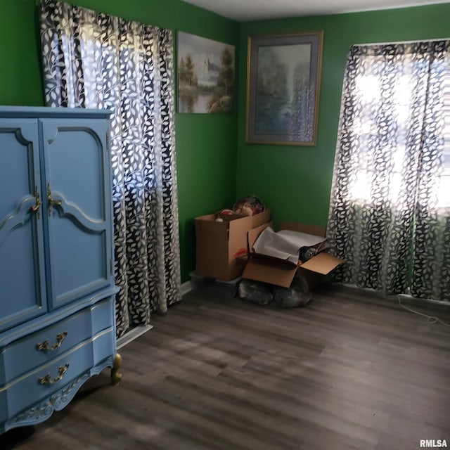 bedroom featuring dark wood-type flooring