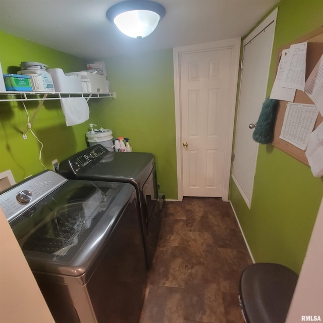 washroom with washer and clothes dryer