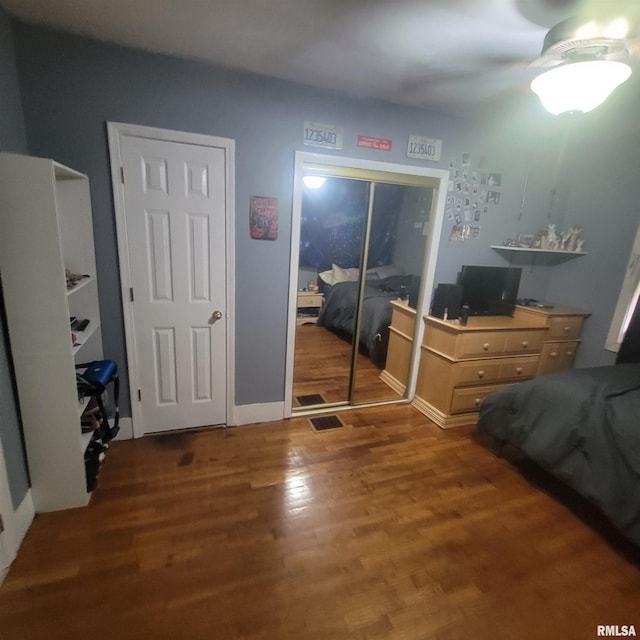 bedroom featuring dark hardwood / wood-style floors