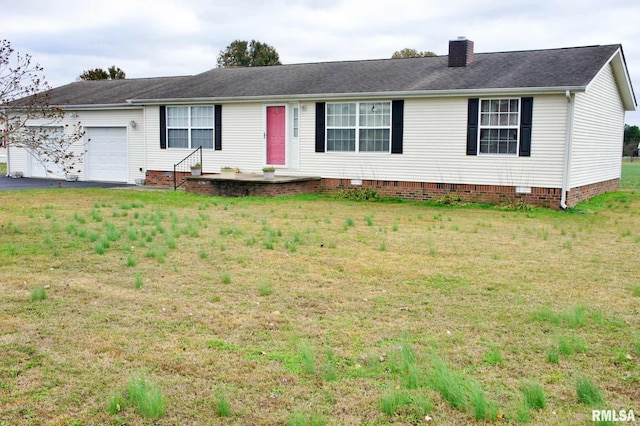 ranch-style house featuring a garage and a front lawn