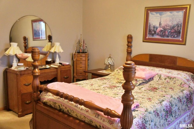 bedroom featuring light carpet