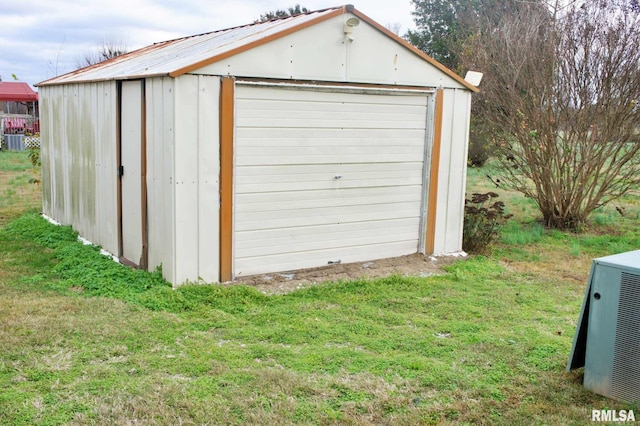 garage with a yard