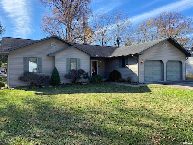 ranch-style home with a garage and a front yard