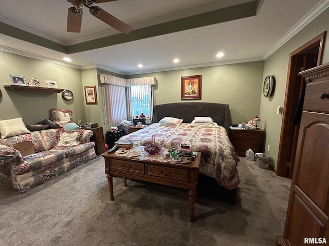 carpeted bedroom featuring crown molding and ceiling fan