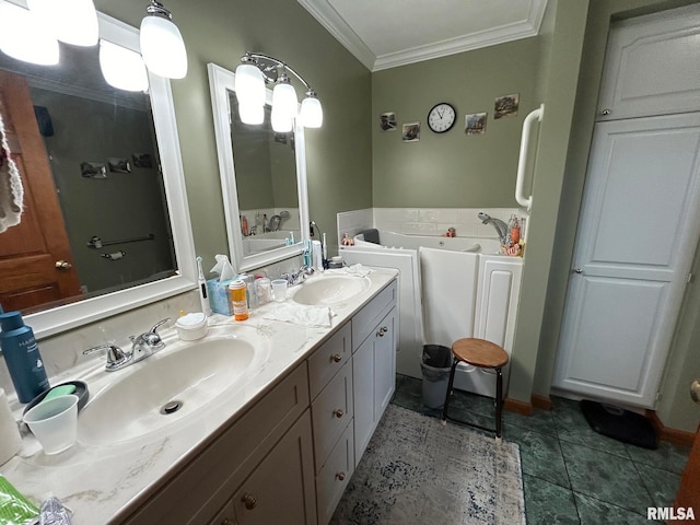 bathroom with tile patterned floors, vanity, ornamental molding, and a tub to relax in