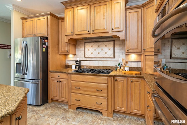 kitchen featuring backsplash, crown molding, light stone countertops, and stainless steel appliances