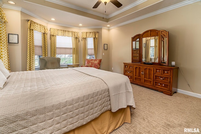 carpeted bedroom featuring ceiling fan and crown molding