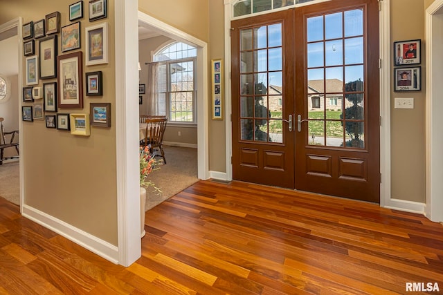 entryway featuring french doors and hardwood / wood-style floors