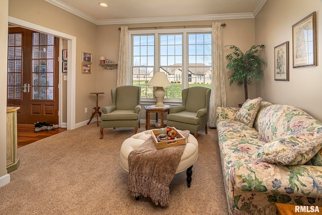 living room featuring carpet, crown molding, and french doors