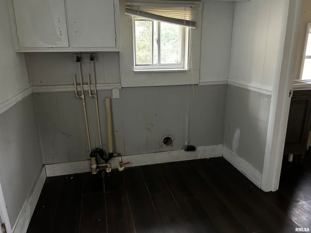 washroom with cabinets and dark hardwood / wood-style flooring