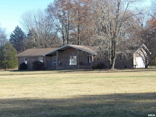 ranch-style house with a front lawn