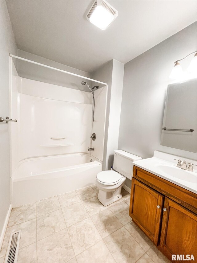 full bathroom featuring toilet, vanity, bathing tub / shower combination, and tile patterned flooring