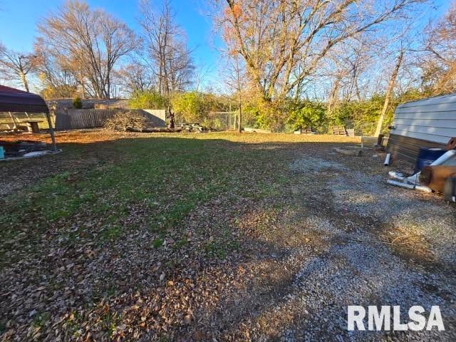 view of yard featuring a carport