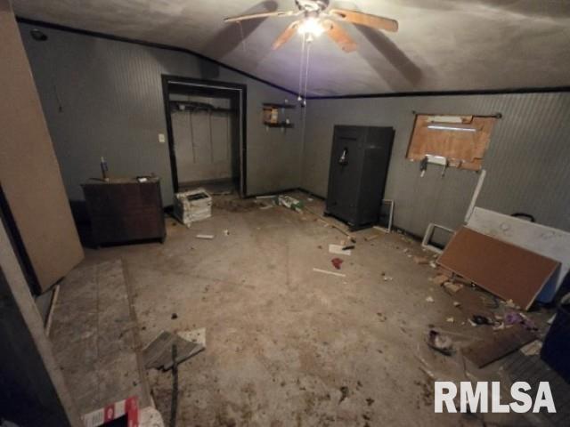 basement featuring ceiling fan