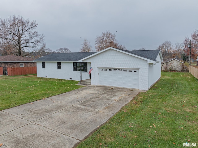 single story home featuring a front lawn and a garage